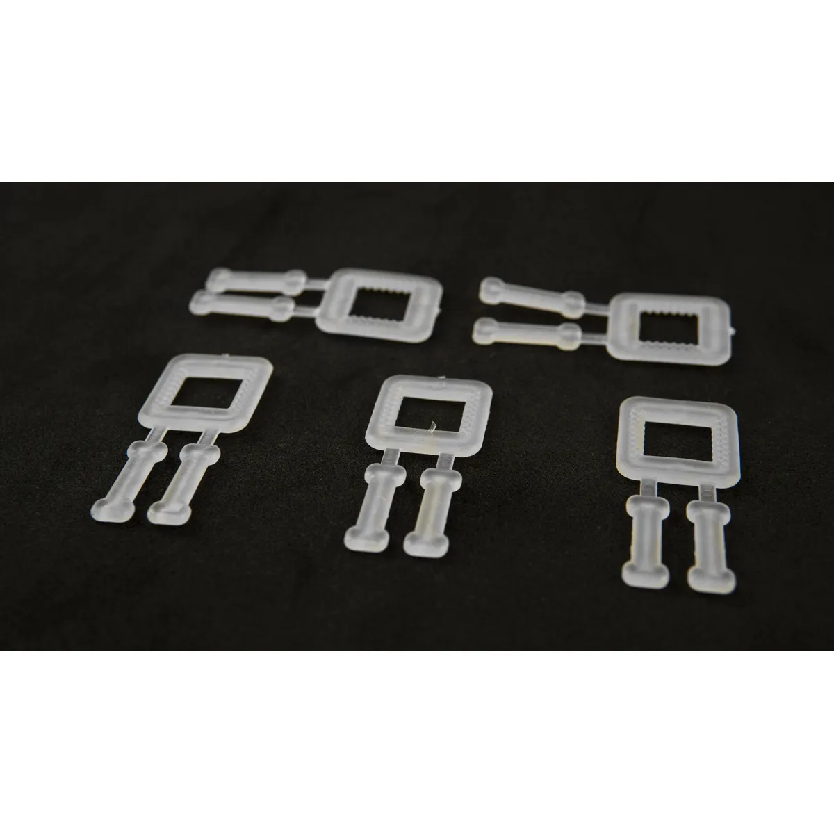 Detalle de las hebillas de plástico BUCKLES-5P para fleje de PP de 12 mm